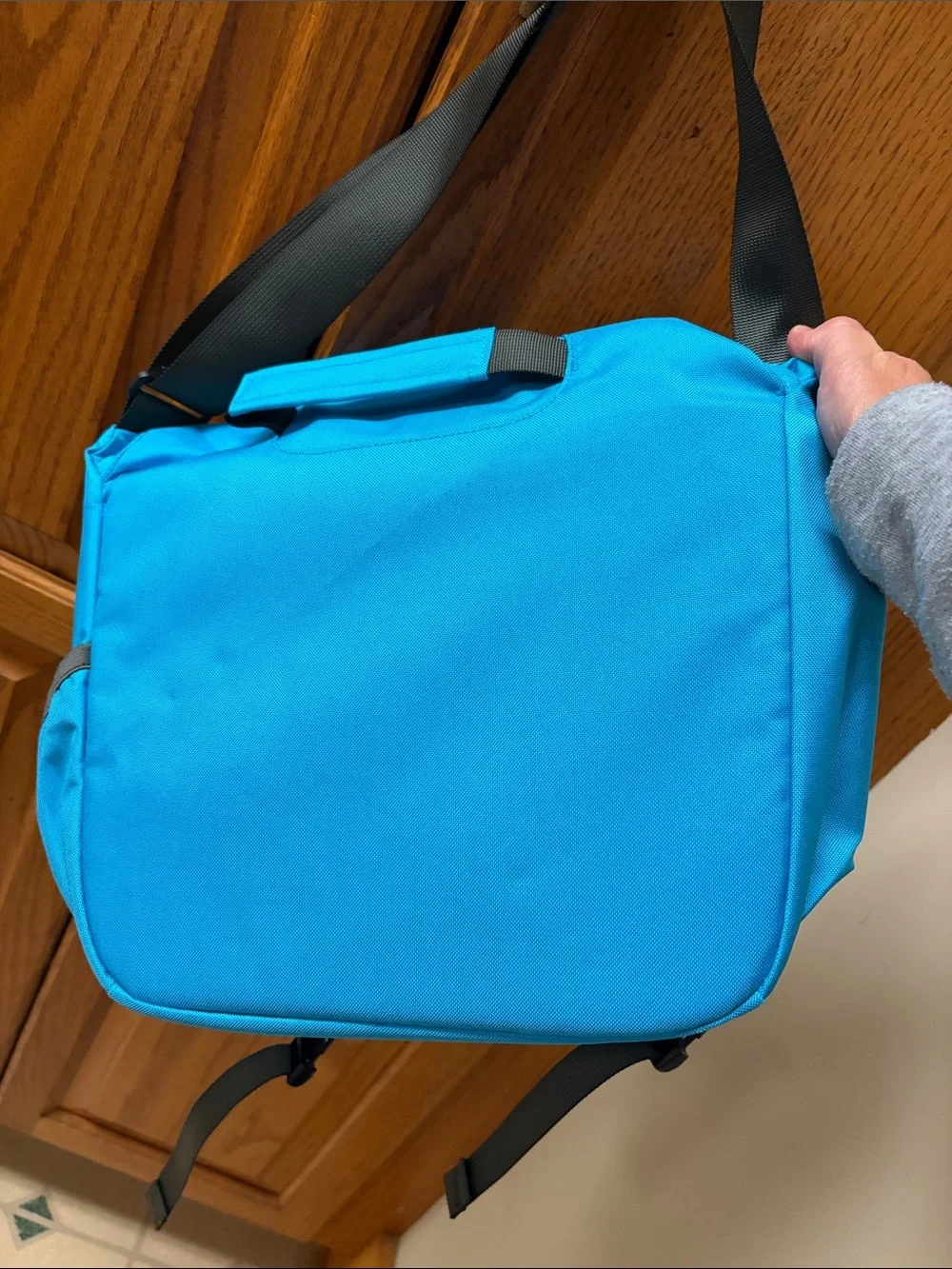Patagonia Bright Turquoise Messenger Bag with Reflective Strip